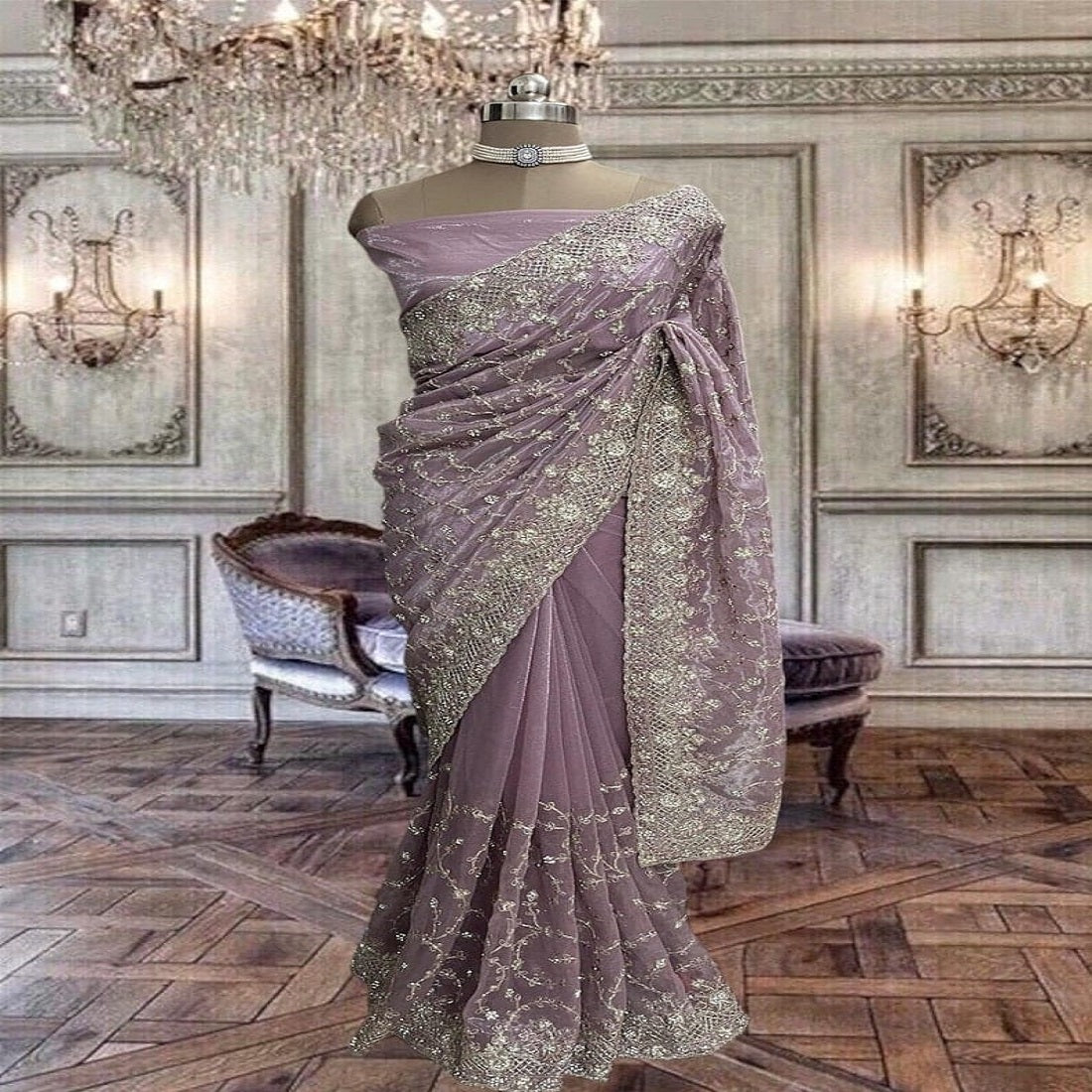 Beautiful net saree with colourful thread work and running blouse piece