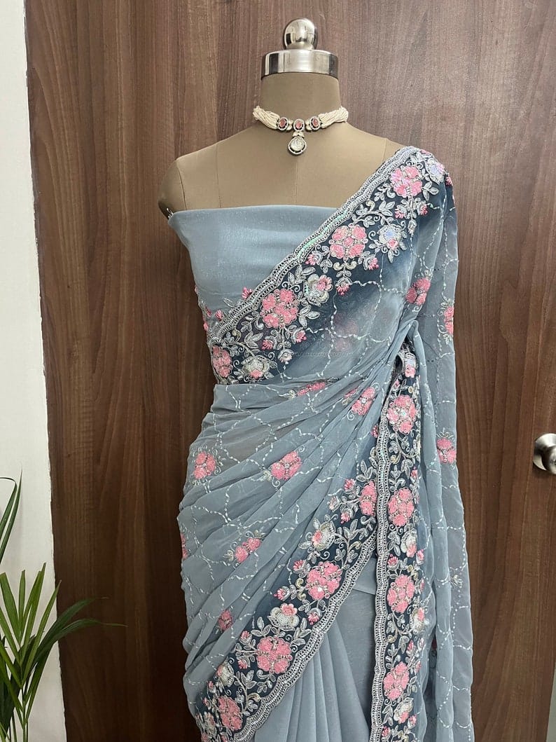 BeautiFashionkiya ful light grey shimmer georgette saree with thread and sequins work and running blouse piece