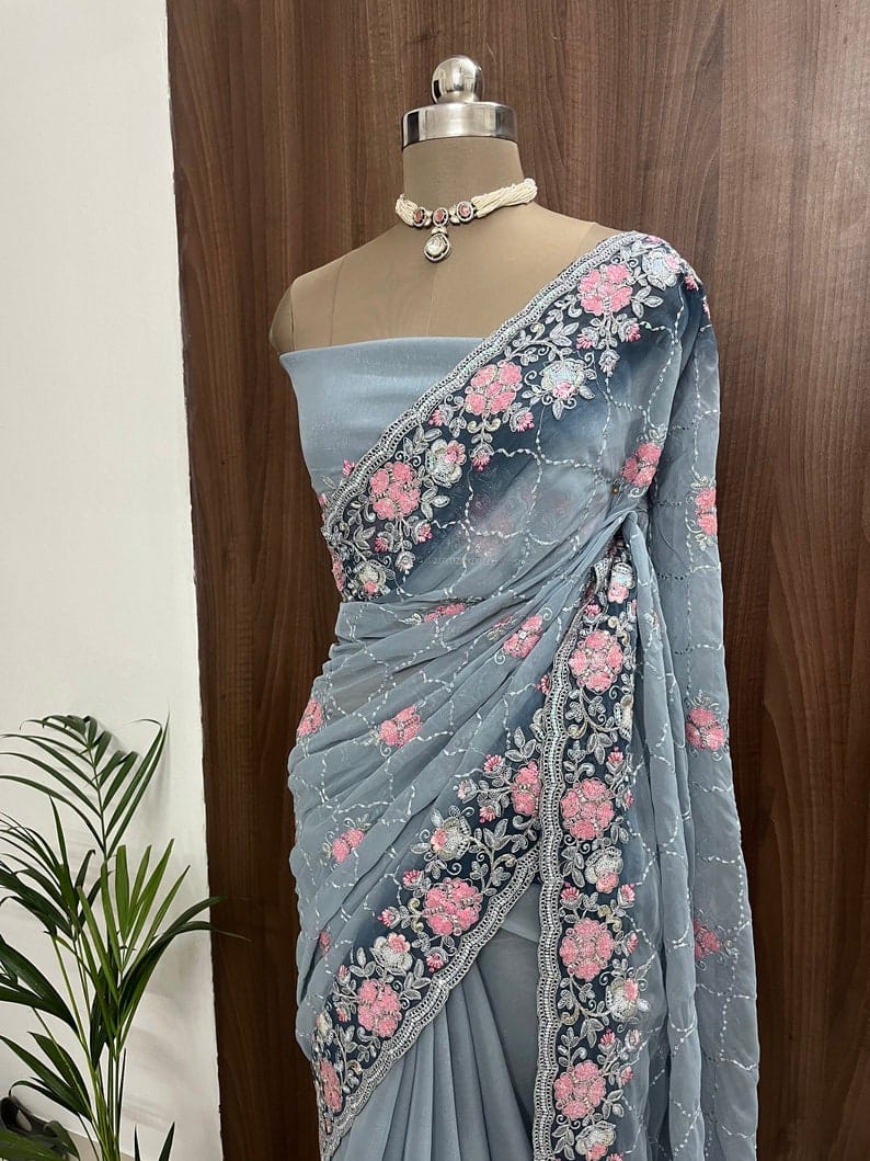 BeautiFashionkiya ful light grey shimmer georgette saree with thread and sequins work and running blouse piece